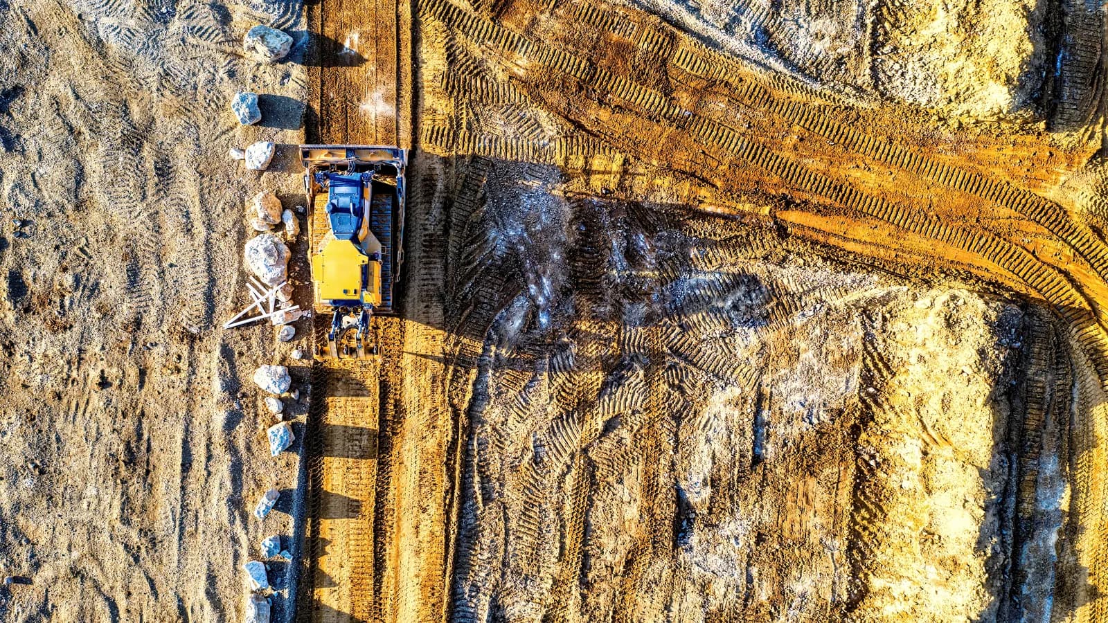 Tracked heavy equipment working at a construction site